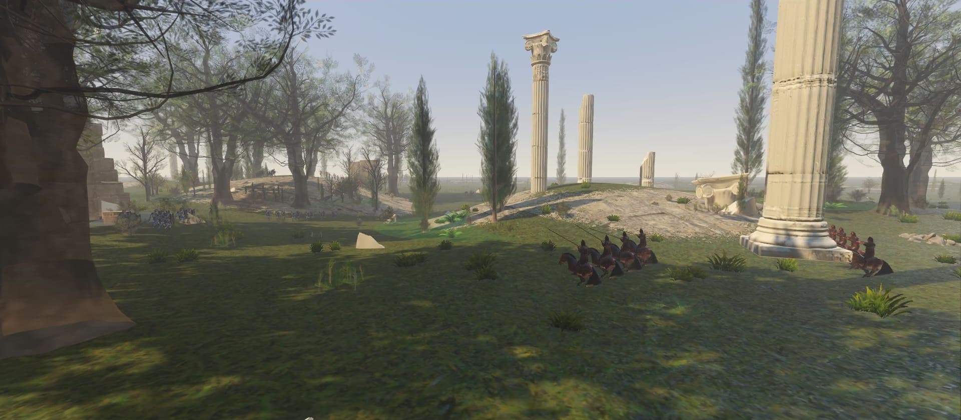 Riders moving between ruined columns